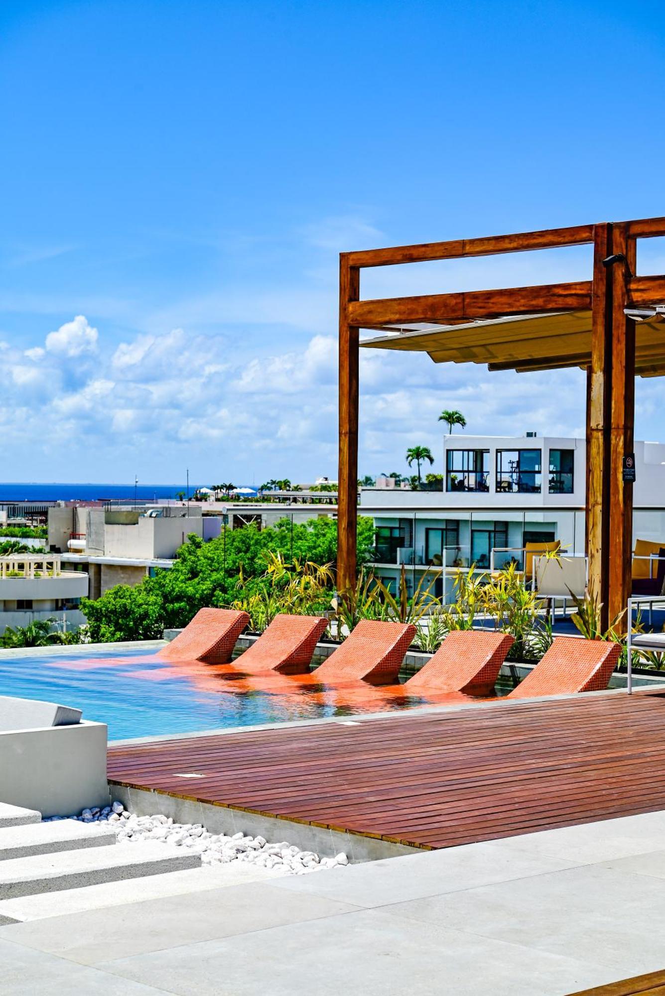 Aloft Playa Del Carmen 호텔 외부 사진 Rooftop pool at the Hotel Habitas Tulum