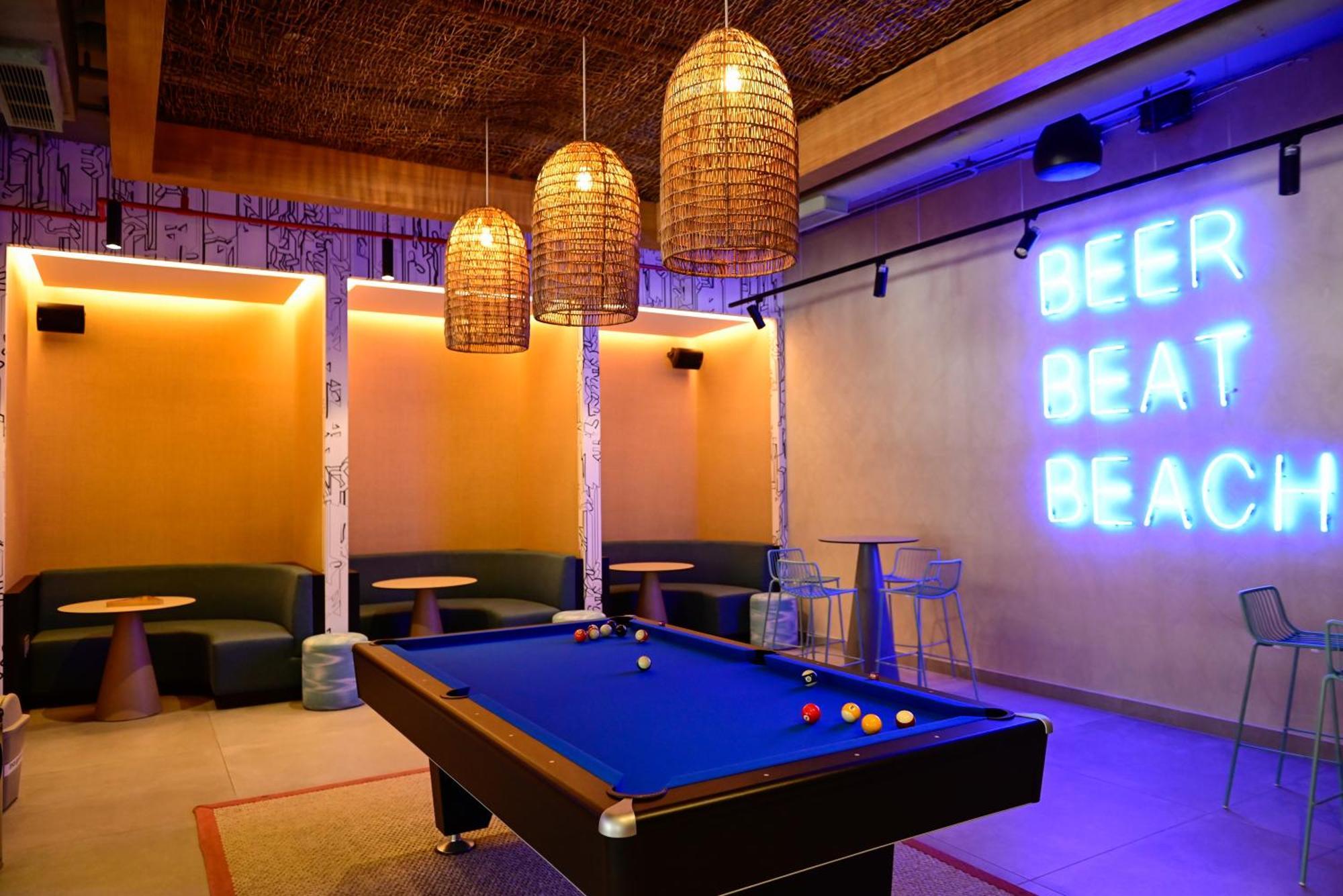 Aloft Playa Del Carmen 호텔 외부 사진 The interior of the bar