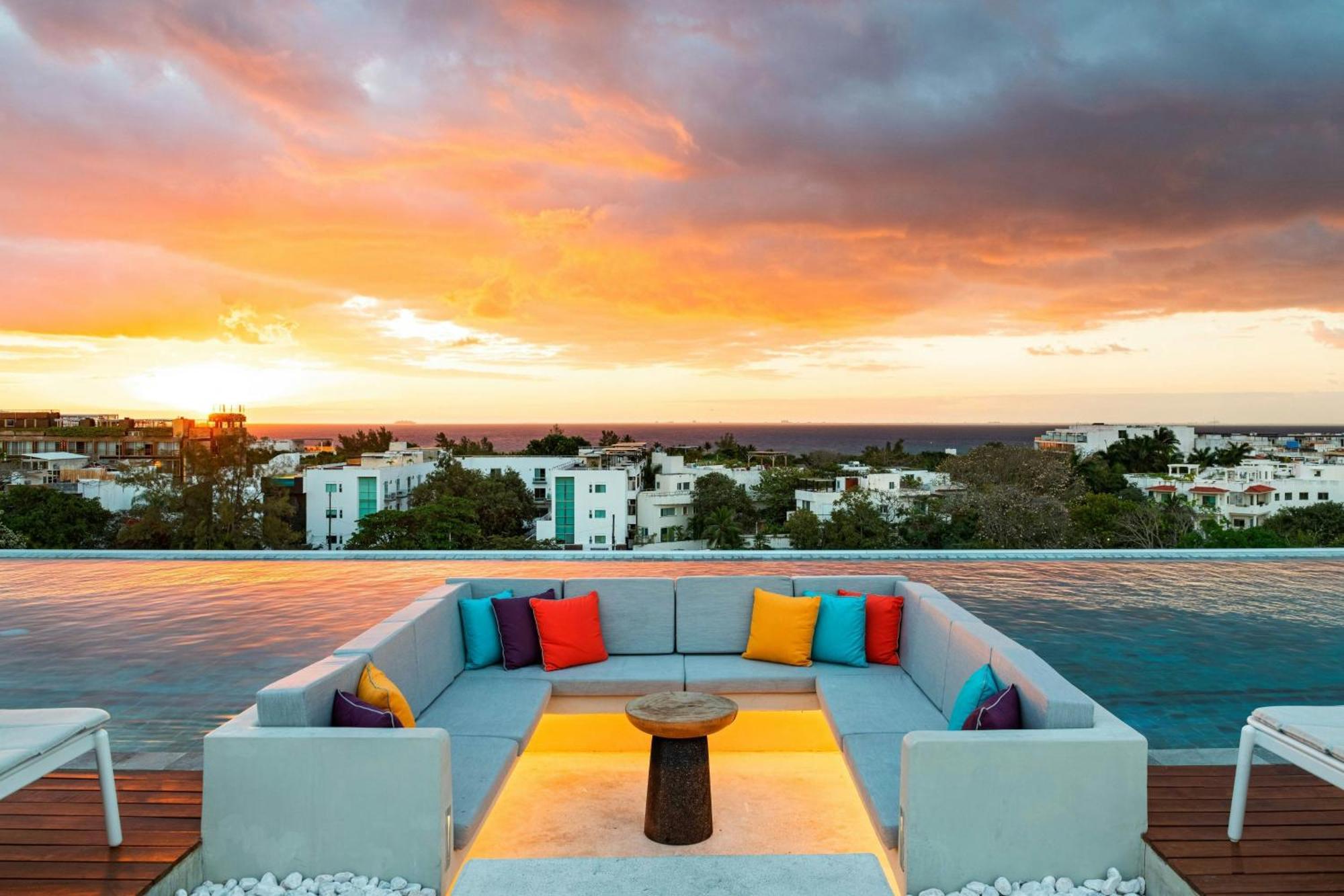 Aloft Playa Del Carmen 호텔 외부 사진 Sunset at the rooftop pool